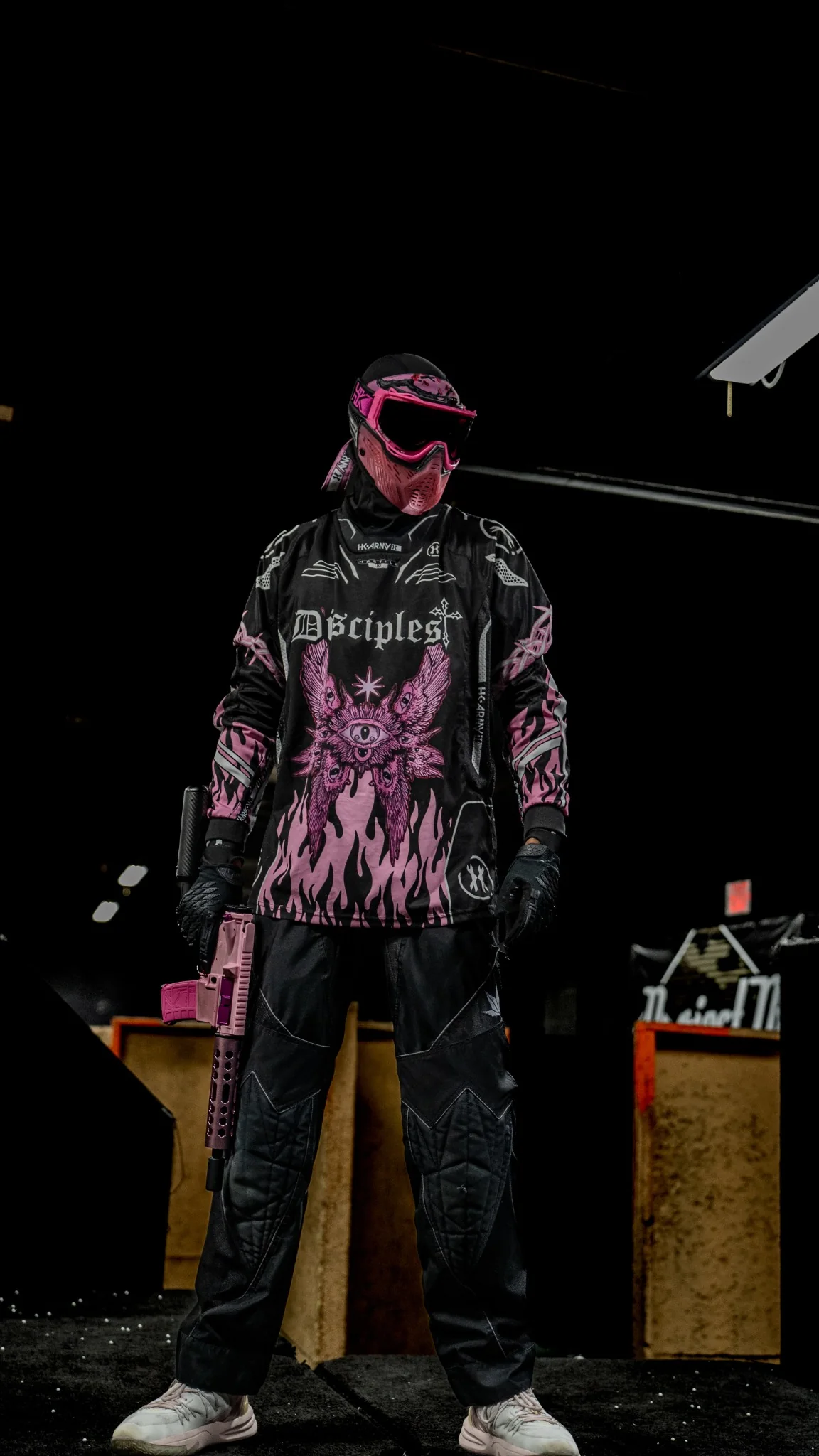 Disciples Airsoft player wearing the black and pink seraphim jersey at the field